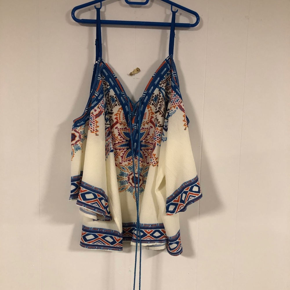 Cold shoulder top with tassel ties